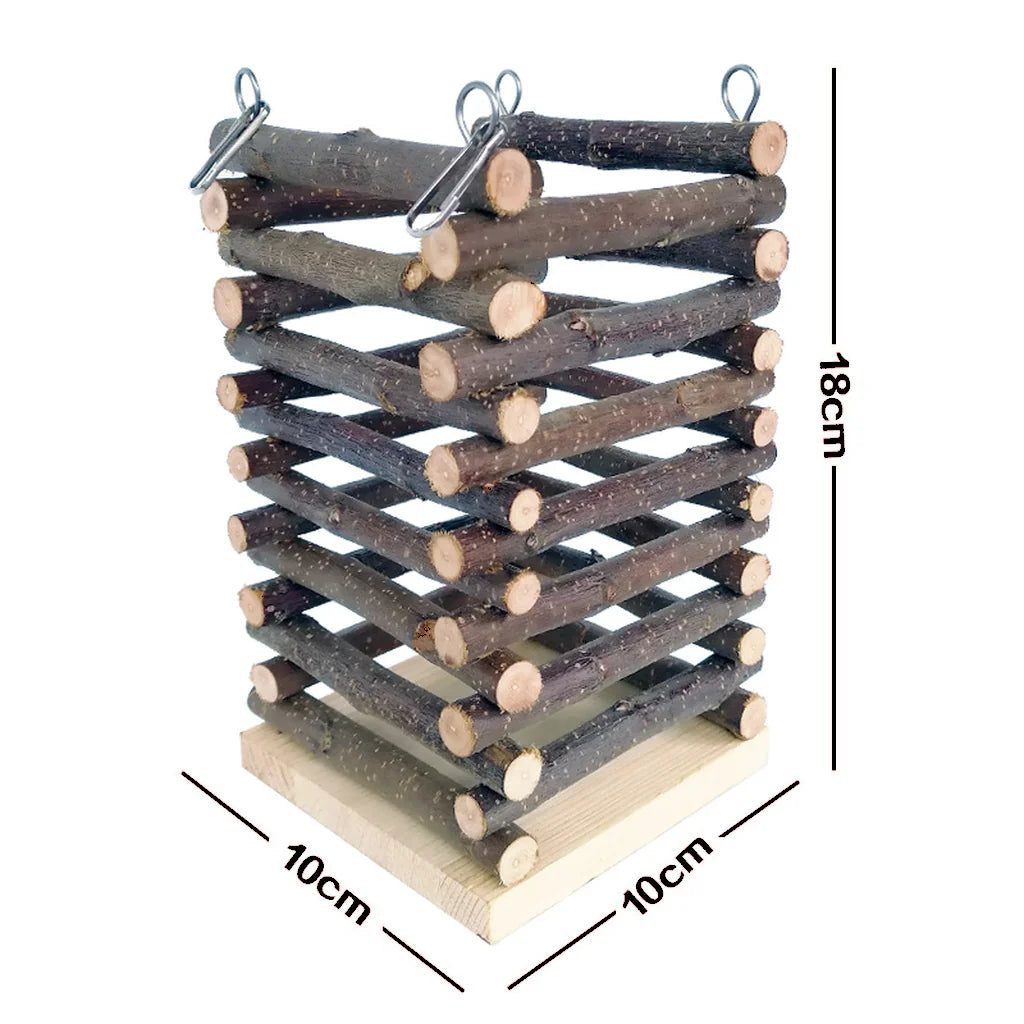 A wooden bird feeder made of stacked natural wood branches on a rectangular base, shown with dimension lines indicating 18 cm height and 10 cm width and depth.