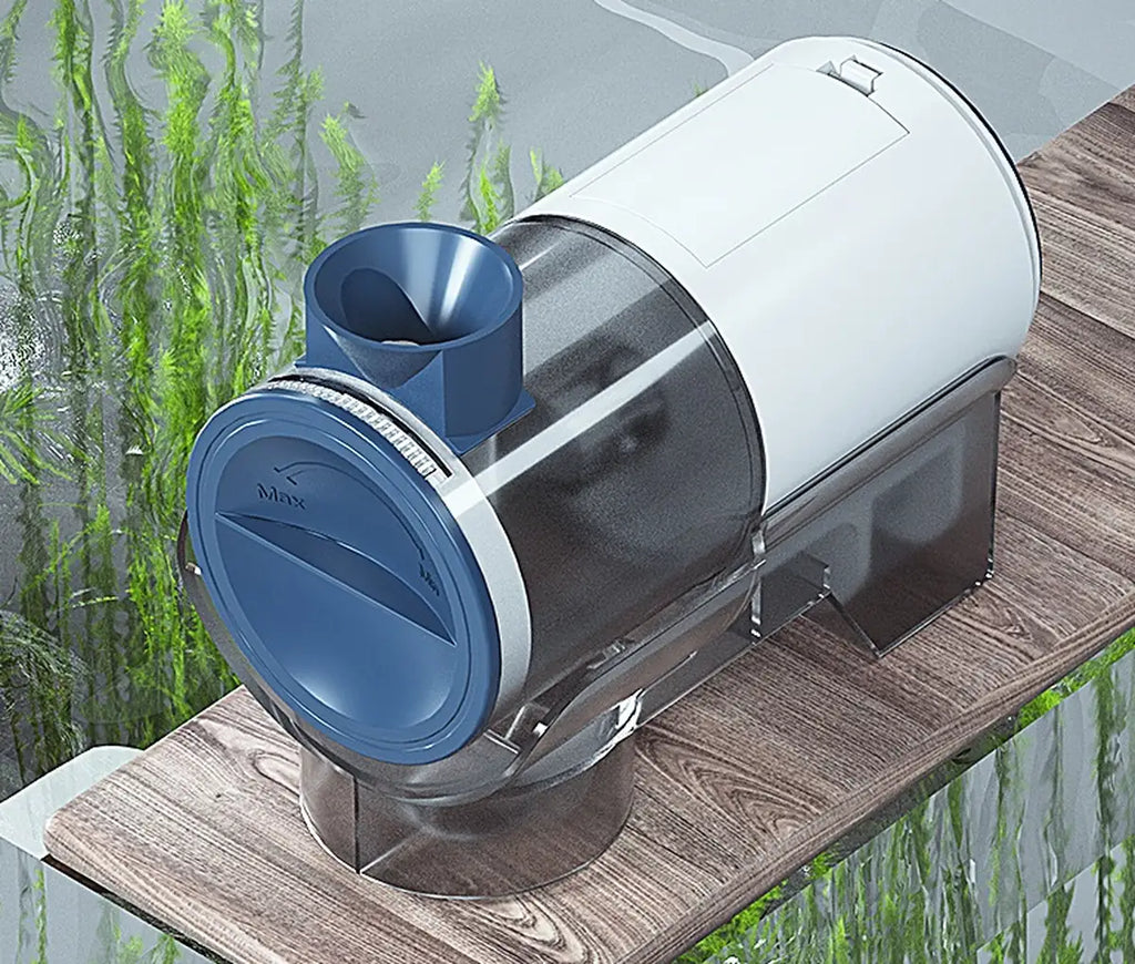 Automatic aquarium fish food feeder with adjustable dispensing control mounted on the edge of a fish tank.
