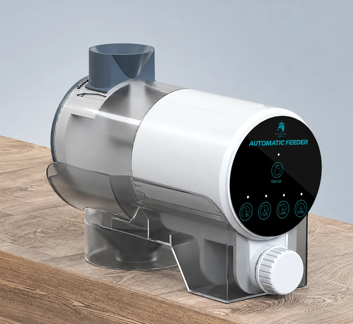 Automatic aquarium fish feeder with programmable digital control panel and transparent feed hopper on a wooden surface.