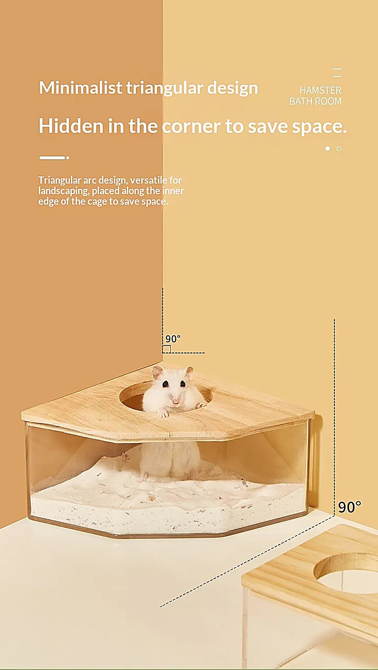 Corner triangular hamster sand bath with clear acrylic base and wooden lid, designed to fit neatly in the corner of a small pet cage for space-saving convenience.