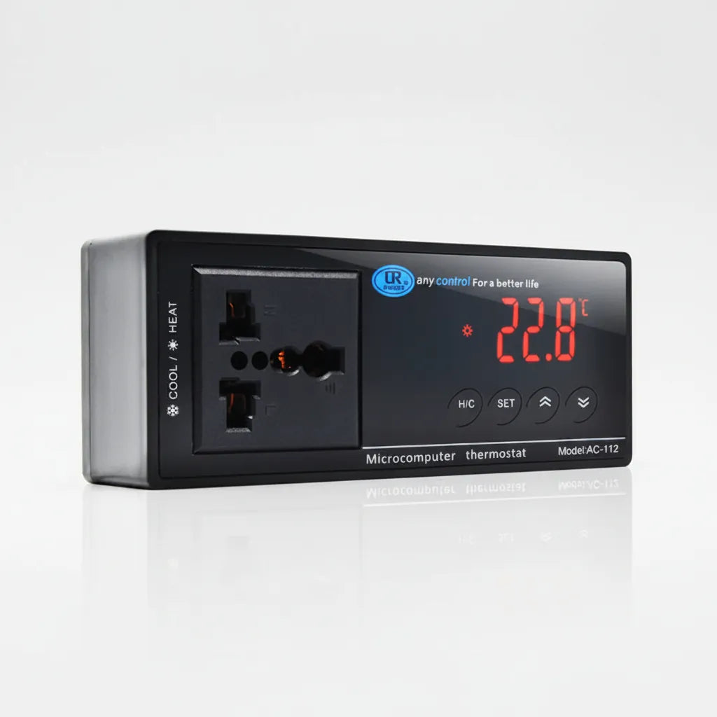 A black UR microcomputer thermostat wall unit with integrated outlets and a red LED temperature display showing 22.0°C, set against a clean white background with a soft reflection.