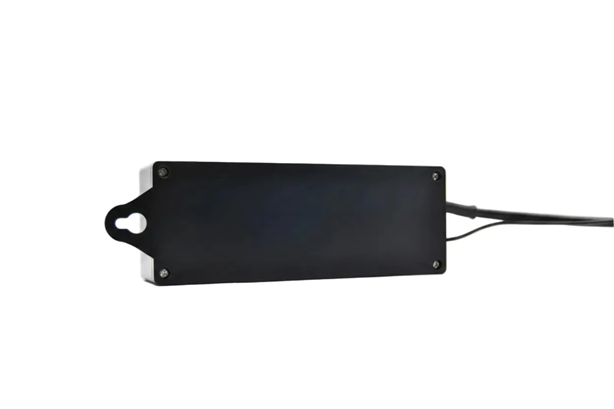 A black rectangular electronic sensor or module with a mounting hole on one end and a cable extending from the side, shown against a plain white background.